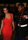 Kim Kardashian - In red dress at HQ Battery 10th Marine Birthday Ball in North Carolina